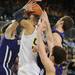 Michigan sophomore Jordan Morgan fights for the ball under the net in the first quarter against Northwestern at Crisler Center on Wedensday. Melanie Maxwell I AnnArbor.com